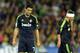 SEVILLE, SPAIN - NOVEMBER 24: Cristiano Ronaldo (L) of Real Madrid CF reacts beside Fabio Coentrao during the La Liga match between Real Betis Balompie and Real Madrid CF at Estadio Benito Villamarin on November 24, 2012 in Seville, Spain. (Photo by Denis Doyle/Getty Images)