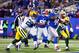 EAST RUTHERFORD, NJ - NOVEMBER 25: Running back Ahmad Bradshaw #44 of the New York Giants scores a touchdown in the second quarter past cornerback Casey Hayward #29 of the Green Bay Packers at MetLife Stadium on November 25, 2012 in East Rutherford, New Jersey. (Photo by Al Bello/Getty Images)
