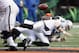 CINCINNATI, OH - NOVEMBER 25: Carson Palmer #3 of the Oakland Raiders fumbles the football after being sacked during the game against the Cincinnati Bengals at Paul Brown Stadium on November 25, 2012 in Cincinnati, Ohio. The Bengals defeated the Bengals 34-10. (Photo by John Grieshop/Getty Images)