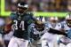 PHILADELPHIA, PA - NOVEMBER 26: Bryce Brown #34 of the Philadelphia Eagles carries the ball in for a touchdown as Sherrod Martin #23 of the Carolina Panthers defends on November 26, 2012 at Lincoln Financial Field in Philadelphia, Pennsylvania. (Photo by Elsa/Getty Images)