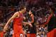 PHOENIX, AZ - NOVEMBER 14: Joakim Noah #13 of the Chicago Bulls high fives teammates after scoring against the Phoenix Suns during the NBA game at US Airways Center on November 14, 2012 in Phoenix, Arizona. The Bulls defeated the Suns 112-106 in overtime. NOTE TO USER: User expressly acknowledges and agrees that, by downloading and or using this photograph, User is consenting to the terms and conditions of the Getty Images License Agreement. (Photo by Christian Petersen/Getty Images)
