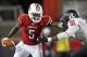 LOUISVILLE, KY - OCTOBER 21: Teddy Bridgewater #5 of the Louisville Cardinals runs with the ball while defended by Justin Francis #91 of the Rutgers Scarlet Knights during the game at Papa John's Cardinal Stadium on October 21, 2011 in Louisville, Kentucky. (Photo by Andy Lyons/Getty Images)