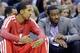WASHINGTON, DC - NOVEMBER 26: Shaun Livingston #14 of the Washington Wizards (L) talks with teammate John Wall #2 (R) during the closing moments of the Wizards 118-92 loss to the San Antonio Spurs at Verizon Center on November 26, 2012 in Washington, DC. NOTE TO USER: User expressly acknowledges and agrees that, by downloading and/or using this photograph, user is consenting to the terms and conditions of the Getty Images License Agreement. (Photo by Rob Carr/Getty Images)