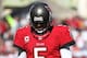 November 25, 2012; Tampa, FL, USA; Tampa Bay Buccaneers quarterback Josh Freeman (5) reacts after a penalty called on the Buccaneers during the second quarter against the Atlanta Falcons at Raymond James Stadium. Mandatory Credit: Kim Klement-US PRESSWIRE