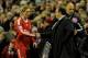 LIVERPOOL, ENGLAND - MARCH 15: Liverpool Manager Rafael Benitez congratulates Fernando Torres as he is substituted during the Barclays Premier League match between Liverpool and Portsmouth at Anfield on March 15, 2010 in Liverpool, England. (Photo by Michael Regan/Getty Images)