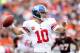 CINCINNATI, OH - NOVEMBER 11: Eli Manning #10 of the New York Giants passes the ball during the NFL game against the Cincinnati Bengals at Paul Brown Stadium on November 11, 2012 in Cincinnati, Ohio. (Photo by Andy Lyons/Getty Images)