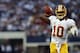ARLINGTON, TX - NOVEMBER 22: Robert Griffin III #10 of the Washington Redskins during a Thanksgiving Day game against the Dallas Cowboys at Cowboys Stadium on November 22, 2012 in Arlington, Texas. (Photo by Ronald Martinez/Getty Images)