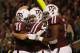 COLLEGE STATION, TX - NOVEMBER 24: Johnny Manziel #2 of the Texas A&M Aggies (C) celebrates a third quarter touchdown with teammates during their game against the Missouri Tigers at Kyle Field on November 24, 2012 in College Station, Texas. (Photo by Scott Halleran/Getty Images)