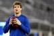 EAST RUTHERFORD, NJ - NOVEMBER 25: Quarterback Eli Manning #10 of the New York Giants warms up prior to playing against the Green Bay Packers at MetLife Stadium on November 25, 2012 in East Rutherford, New Jersey. (Photo by Rich Schultz/Getty Images)