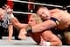 John Cena locks in the STF on Dolph Ziggler. (Courtesy of WWE.com)