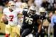 NEW ORLEANS, LA - NOVEMBER 25: Colin Kaepernick #7 of the San Francisco 49ers is pressured by Akiem Hicks #76 of the New Orleans Saints during a game at the Mercedes-Benz Superdome on November 25, 2012 in New Orleans, Louisiana. (Photo by Stacy Revere/Getty Images)