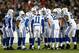 FOXBORO, MA - NOVEMBER 18: Andrew Luck #12 of the Indianapolis Colts runs huddles with his team against the New England Patriots during the game on November 18, 2012 at Gillette Stadium in Foxboro, Massachusetts. (Photo by Jared Wickerham/Getty Images)
