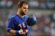 ANAHEIM, CA - AUGUST 16: Mike Napoli #25 of the Texas Rangers reacts after a strikeout against the Los Angeles Angels of Anaheim at Angel Stadium of Anaheim on August 16, 2011 in Anaheim, California. (Photo by Harry How/Getty Images)