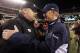 PHILADELPHIA, PA - JANUARY 02: Head coach Andy Reid of the Philadelphia Eagles meets with head coach Jason Garrett of the Dallas Cowboys after their game on January 2, 2011 at Lincoln Financial Field in Philadelphia, Pennsylvania. The Cowboys defeated the Eagles 14-13. (Photo by Jim McIsaac/Getty Images)