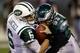 PHILADELPHIA, PA - DECEMBER 18: Mark Sanchez #6 of the New York Jets is sacked by Jason Babin #93 of the Philadelphia Eagles during the first half at Lincoln Financial Field on December 18, 2011 in Philadelphia, Pennsylvania. (Photo by Rob Carr/Getty Images)