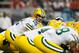 ATLANTA, GA - OCTOBER 09: Aaron Rodgers #12 of the Green Bay Packers lines up behind his offensive line against the Atlanta Falcons at Georgia Dome on October 9, 2011 in Atlanta, Georgia. (Photo by Kevin C. Cox/Getty Images)