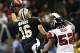 NEW ORLEANS, LA - NOVEMBER 11: Lance Moore #16 of the New Orleans Saints catches a pass one-handed over Akeem Dent #52 of the Atlanta Falcons at Mercedes-Benz Superdome on November 11, 2012 in New Orleans, Louisiana. The Saints defeated the Falcons 31-27. (Photo by Wesley Hitt/Getty Images)