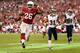 GLENDALE, AZ - NOVEMBER 25: Running back Beanie Wells #26 of the Arizona Cardinals carries the football into the endzone to score a 12 yard rushing touchdown past cornerback Cortland Finnegan #31 of the St. Louis Rams during the second quarter of the NFL game at the University of Phoenix Stadium on November 25, 2012 in Glendale, Arizona. (Photo by Christian Petersen/Getty Images)