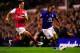 LIVERPOOL, ENGLAND - MARCH 21: Arsenal player Mikel Arteta (l) is beaten to the ball by Steven Pienaar during the Barclays Premier League match between Everton v Arsenal at Goodison Park on March 21, 2012 in Liverpool, England. (Photo by Stu Forster/Getty Images)