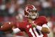 ARLINGTON, TX - SEPTEMBER 01: A J McCarron #10 of Alabama Crimson Tide warms up prior to the start of the game against Michigan Wolverines at Cowboys Stadium on September 1, 2012 in Arlington, Texas. (Photo by Leon Halip/Getty Images)