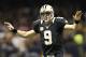 NEW ORLEANS, LA - NOVEMBER 11: Drew Brees #9 of the New Orleans Saints quiets down the crowd during a game against the Atlanta Falcons at Mercedes-Benz Superdome on November 11, 2012 in New Orleans, Louisiana. The Saints defeated the Falcons 31-27(Photo by Wesley Hitt/Getty Images)