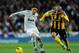 MADRID, SPAIN - JANUARY 28: Mesut Ozil (L) of Real Madrid breaks away from Aranda of Real Zaragoza during the La Liga match between Real Madrid and Real Zaragoza at Estadio Santiago Bernabeu on January 28, 2012 in Madrid, Spain. (Photo by Denis Doyle/Getty Images)