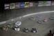ROSSBURG, OH - JUNE 06: Cars race down the back stretch during the Feed the Children Prelude to the Dream at Eldora Speedway on June 6, 2012 in Rossburg, Ohio. (Photo by Tyler Barrick/Getty Images for True Speed Communication)