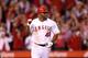 ANAHEIM, CA - SEPTEMBER 26: Torii Hunter #48 of the Los Angeles Angels of Anaheim celebrates as he runs to first base on his walk off RBI single in the ninth inning to win the game against the Seattle Mariners at Angel Stadium of Anaheim on September 26, 2012 in Anaheim, California. The Angels won 4-3. (Photo by Stephen Dunn/Getty Images)