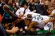 BOSTON, MA - NOVEMBER 28: Paul Pierce #34 and Rajon Rondo #9 of the Boston Celtics fight with Kris Humphries #43 of the Brooklyn Nets while security and referees attempt to break it up behind the basket after Humphries fouled Kevin Garnett #5 of the Boston Celtics during the game on November 28, 2012 at TD Garden in Boston, Massachusetts. Kris Humphries and Rajon Rondo would be immediately ejected from the game. NOTE TO USER: User expressly acknowledges and agrees that, by downloading and or using this photograph, User is consenting to the terms and conditions of the Getty Images License Agreement. (Photo by Jared Wickerham/Getty Images)