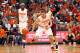 SYRACUSE, NY - NOVEMBER 25: Brandon Triche #20 of the Syracuse Orange reaches for the ball as teammate C.J. Fair looks on against Mitch Rolls #2 of the Colgate Raiders during the game at the Carrier Dome on November 25, 2012 in Syracuse, New York. (Photo by Nate Shron/Getty Images)