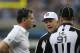 DETROIT, MI - NOVEMBER 22: Detroit Lions head coach Jim Schwartz (L) talks with NFL referee Walt Coleman during a disputed play during the game against the Houston Texans at Ford Field on November 22, 2012 in Detroit, Michigan. The Texans defeated the Lions 34-31. (Photo by Leon Halip/Getty Images)