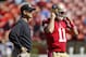 SAN FRANCISCO, CA - OCTOBER 7: Head coach Jim Harbaugh and quarterback Alex Smith #11 of the San Francisco 49ers prepare before a game against the Buffalo Bills on October 7, 2012 at Candlestick Park in San Francisco, California. The 49ers won 45-3. (Photo by Brian Bahr/Getty Images)