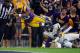 BATON ROUGE, LA - SEPTEMBER 29: Jordan Love #7 of the Towson Tigers is unable to stop Russell Shepard #10 of the LSU Tigers as he dives for the endzone during a game at Tiger Stadium on September 29, 2012 in Baton Rouge, Louisiana. (Photo by Stacy Revere/Getty Images)