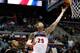 AUBURN HILLS, MI - NOVEMBER 16: Kyle Singler #25 of the Detroit Pistons gets to the basket past Glen Davis #11 of the Orlando Magic at the Palace of Auburn Hills on November 16, 2012 in Auburn Hills, Michigan. Orlando won the game 110-106. NOTE TO USER: User expressly acknowledges and agrees that, by downloading and or using this photograph, User is consenting to the terms and conditions of the Getty Images License Agreement. (Photo by Gregory Shamus/Getty Images)