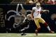 NEW ORLEANS, LA - NOVEMBER 25: Colin Kaepernick #7 of the San Francisco 49ers avoids a tackle by Curtis Lofton #50 of the New Orleans Saints at The Mercedes-Benz Superdome on November 25, 2012 in New Orleans, Louisiana. The 49ers defeated the Saints 31-21. (Photo by Chris Graythen/Getty Images)