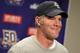 DETROIT, MI - JANUARY 02: Brett Favre #4 of the Minnesota Vikings talks at a post game press conference after a 13-20 loss to the Detroit Lions at Ford Field on January 2, 2011 in Detroit, Michigan. (Photo by Gregory Shamus/Getty Images)