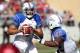 Nov 17, 2012; Tulsa, OK, USA; Tulsa Hurricanes offensive guard Gabe Moyer (65) blocks as tailback Trey Watts (22) carries the ball past University of Central Florida Knights defensive linemen Cam Henderson (49) and linebacker Jonathan Davis (11) during the second half of a game at Skelly Field at H.A. Chapman Stadium. Tulsa defeated UCF 23-21. Mandatory Credit: Beth Hall-US PRESSWIRE