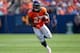 DENVER, CO - AUGUST 26: Running back Knowshon Moreno #27 of the Denver Broncos in action during a pre-season game against the San Francisco 49ers at Sports Authority Field Field at Mile High on August 26, 2012 in Denver, Colorado. (Photo by Justin Edmonds/Getty Images)
