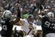 September 23, 2012; Oakland, CA, USA; Pittsburgh Steelers quarterback Ben Roethlisberger (7) throws a pass as Oakland Raiders defensive end Lamarr Houston (99) and defensive tackle Tommy Kelly (93) attempt to block the throw. Mandatory Credit: Ed Szczepanski-US PRESSWIRE