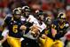Nov 30, 2012; Detroit, MI, USA; Northern Illinois Huskies quarterback Jordan Lynch (6) runs out of the pocket in the first quarter of the 2012 MAC Championship against the Kent State Golden Flashes at Ford Field. Mandatory Credit: Andrew Weber-US PRESSWIRE