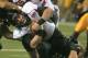 DETROIT, MI - NOVEMBER 30: Jordan Lynch #6 of Northern Illinois is tackled by Luke Batton #30 of Kent State during the Mid-American Conference Championship game at Ford Field on November 30, 2012 in Detroit, Michigan. (Photo by Dave Reginek/Getty Images)