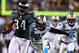 PHILADELPHIA, PA - NOVEMBER 26: Bryce Brown #34 of the Philadelphia Eagles carries the ball in for a touchdown as Sherrod Martin #23 of the Carolina Panthers defends on November 26, 2012 at Lincoln Financial Field in Philadelphia, Pennsylvania. (Photo by Elsa/Getty Images)