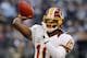 ARLINGTON, TX - NOVEMBER 22: Robert Griffin III #10 of the Washington Redskins warms up before taking on the Dallas Cowboys on Thanksgiving Day at Cowboys Stadium on November 22, 2012 in Arlington, Texas. (Photo by Tom Pennington/Getty Images)