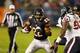 CHICAGO, IL - NOVEMBER 11: Running back Matt Forte #22 of the Chicago Bears carries the ball against the defense of defensive tackle Earl Mitchell #92 of the Houston Texans during the game at Soldier Field on November 11, 2012 in Chicago, Illinois. (Photo by Jonathan Daniel/Getty Images)