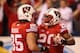 INDIANAPOLIS, IN - DECEMBER 01: James White #20 of the Wisconsin Badgers celebrates with teammate Brian Wozniak #85 after scoring on a 68 yard third quarter touchdown during the Big Ten Championship game against the Nebraska Cornhuskers at Lucas Oil Stadium on December 1, 2012 in Indianapolis, Indiana. (Photo by Leon Halip/Getty Images)
