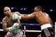 Austin Trout bruised, bloodied and beat up Miguel Cotto Saturday night at Madison Square Garden.
