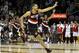 Dec 1, 2012; Cleveland, OH, USA; Portland Trail Blazers small forward Nicolas Batum (88) celebrates after making a basket in the first overtime against the Cleveland Cavaliers at Quicken Loans Arena. After an official video review, the basket was waved off and the game entered a second overtime. Mandatory Credit: David Richard-US PRESSWIRE