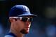 KANSAS CITY, MO - SEPTEMBER 03: Josh Hamilton #32 of the Texas Rangers walks off the field during the game against the Kansas City Royals at Kauffman Stadium on September 3, 2012 in Kansas City, Missouri. (Photo by Jamie Squire/Getty Images)