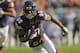 CHICAGO, IL - NOVEMBER 25: Earl Bennett #80 of the Chicago Bears runs for a first down after a catch against the Minnesota Vikings at Soldier Field on November 25, 2012 in Chicago, Illinois. The Bears defeated the Vikings 28-10. (Photo by Jonathan Daniel/Getty Images)