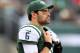 EAST RUTHERFORD, NJ - DECEMBER 02: Mark Sanchez #6 of the New York Jets stands on the sideline after he is pulled from the game in the third quarter against the Arizona Cardinals on December 2, 2012 at MetLife Stadium in East Rutherford, New Jersey. The New York Jets defeated the Arizona Cardinals 7-6.(Photo by Elsa/Getty Images)